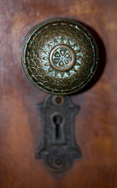 istock Doorknob and keyhole, antique 943884618
