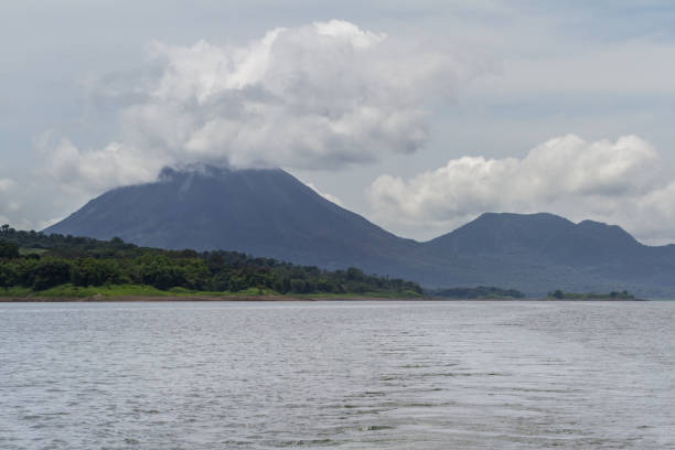 istock Arenal Volcano in the clouds 943893390