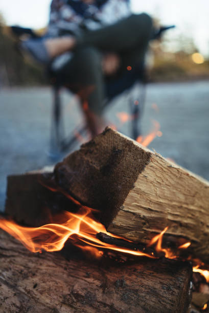 Chopped wood is on fire at the beach