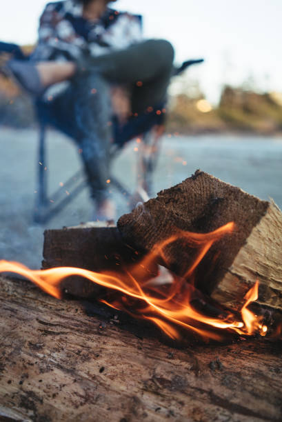 Chopped wood is on fire at the beach