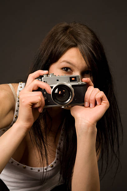 istock Beautiful photographer, focus on camera 94390579