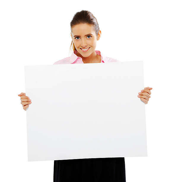 istock young Business woman holding large billboard on white background 94390967