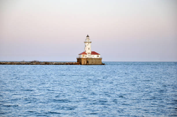 istock Lighthouse at dusk outside Chicago. 943910262