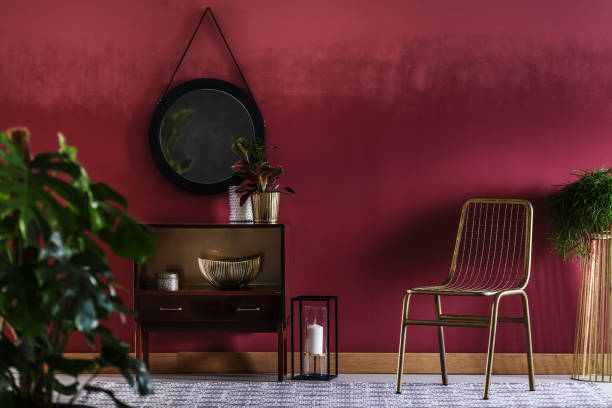 istock Gold chair in red interior 943910346