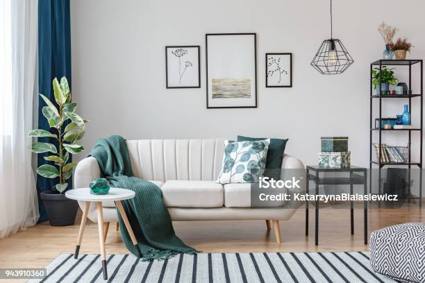 Posters In Cozy Apartment Interior Stock Photo - Download Image Now - Living Room, Sofa, Indoors