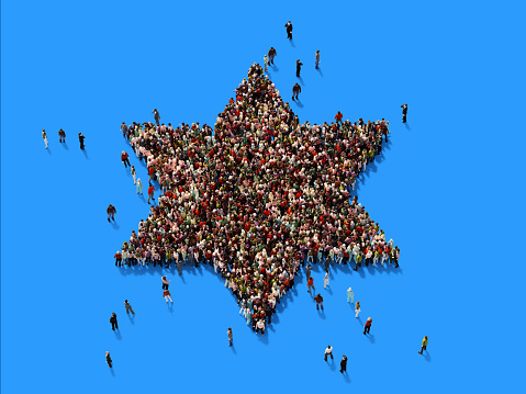 Human crowd forming a big David's star on blue background. Horizontal  composition with copy space. Clipping path is included.