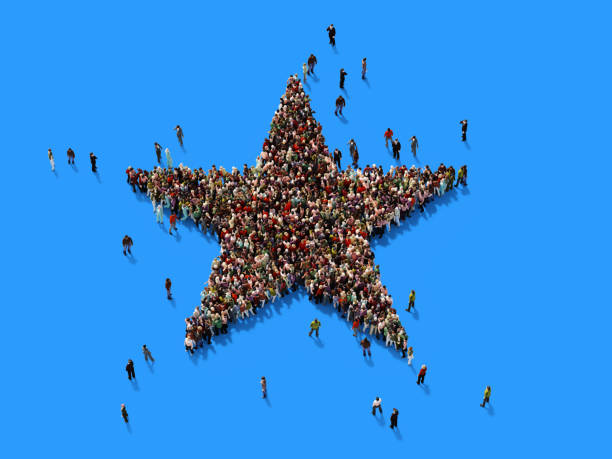 istock Human Crowd Forming A Big Star Shape On Blue Background 943910502
