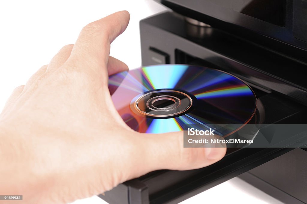 ディスクを挿入 - CD-ROMのロイヤリティフリーストックフォト