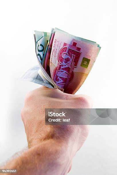 Puño Lleno De Dinero Canadiense Foto de stock y más banco de imágenes de Canadá - Canadá, Dinero, Puño - Gesticular