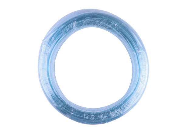 istock Curled garden hose in plastic wrap isolated on white background,with clipping path 943928592