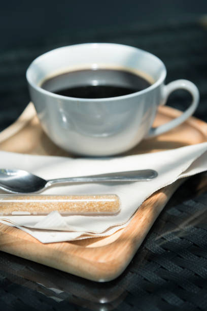 istock Coffee cup and saucer on old wooden table 943935610