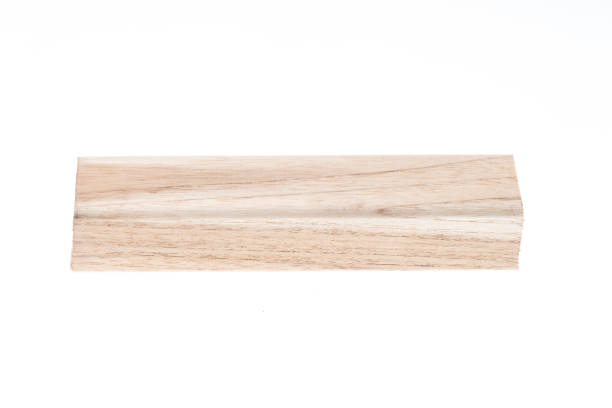 istock Chopped fire wood in a border isolated on white background. Perspective view. 943935768