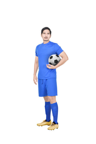 istock Young asian soccer player standing 943938684