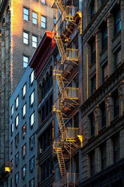 istock Sunlight on fire escape in New York 943939448