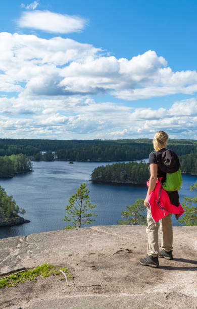 istock Woman hiking and looking view 943947626