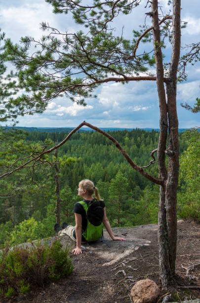 istock Woman hiking and looking at view 943953626