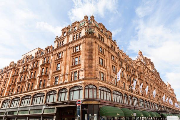 Harrods , luxury department store on Brompton Road, London, United Kingdom London, United Kingdom - June 23, 2017: Harrods , luxury department store on Brompton Road. 7-storey building built in 1905, has 330 departments covering 90,000 m2 of retail space harrods photos stock pictures, royalty-free photos & images
