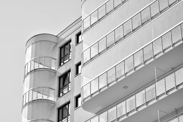istock Facade of a modern apartment building. Black and white. 943978826