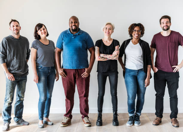 istock Happy diverse friends standing in a row 943979314