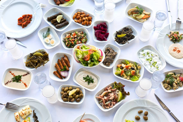 Glasses of Raki and Appetizers Glasses of Raki and Appetizers meze stock pictures, royalty-free photos & images