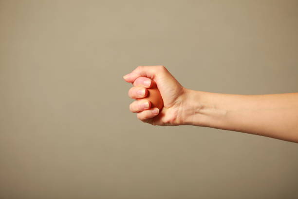 istock raw chicken egg crushed in the hand drains yolk 943986142