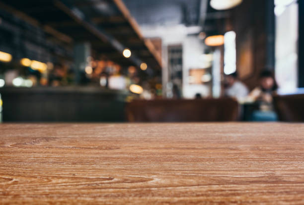 istock Table top counter Blur people drinking in cafe Restaurant 943995372
