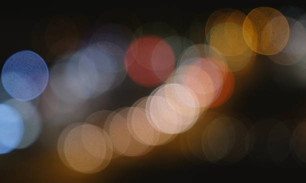 istock Defocused night traffic lights from cars. Abstract blur background. 943996172
