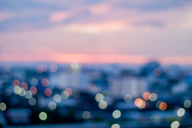 istock abstract blur bokeh of night light city with mountain 943996358