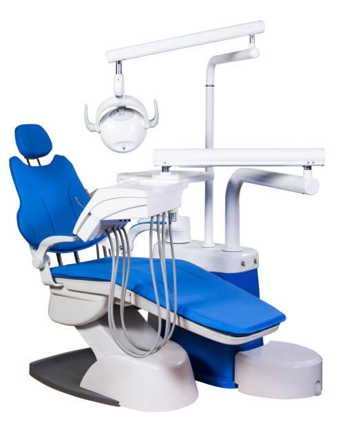 istock Modern blue dentist chair isolated on white background 943996386