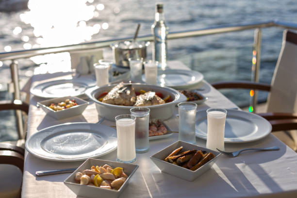 istock Romantic Turkish  Traditional Dinning Table with Special Alcohol Drink Raki, and Beautiful Istanbul Bosphorus View 943999790