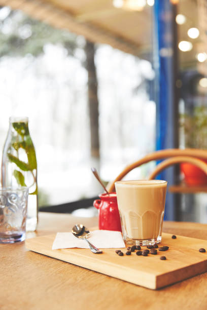 istock Restaurant table with coffee served in glass 943999998