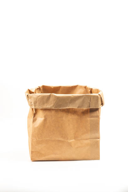 Various kraft paper bags isolated on white background