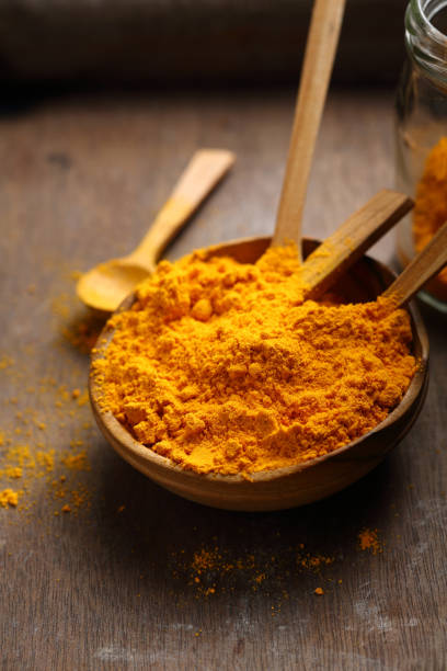 istock Turmeric powder closeup, food 944005176