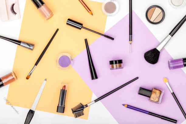 istock set of professional decorative cosmetics, makeup tools and accessory on white background. beauty, fashion, party and shopping concept. trendy flat lay composition, top view 944005356
