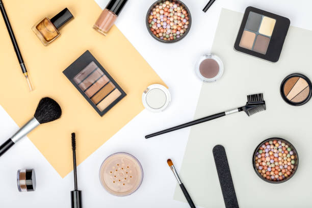 istock set of professional decorative cosmetics, makeup tools and accessory on white background. beauty, fashion, party and shopping concept. trendy flat lay composition, top view 944006768