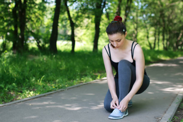 istock woman sport tree starting 944012380