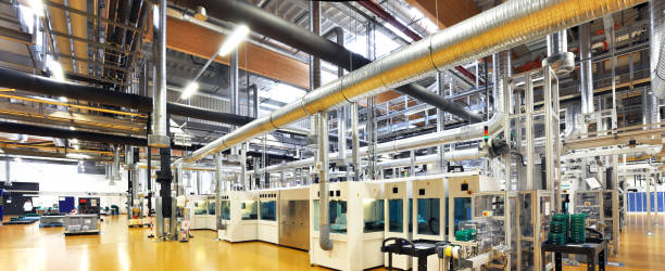 high tech industrie - production of solar cells - production rooms and machines - industrie imagens e fotografias de stock