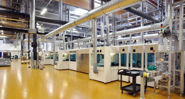 high tech industrie - production of solar cells - production rooms and machines - industrie imagens e fotografias de stock