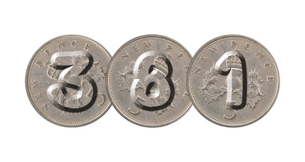 istock Number 381  with old coins on white background 944031030