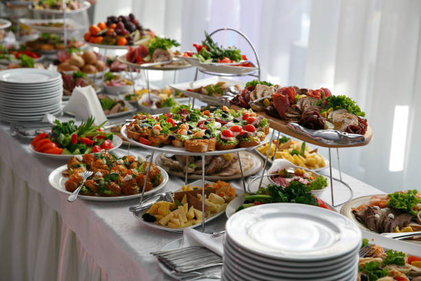 istock Catering service. Restaurant table with food at event. 944034612