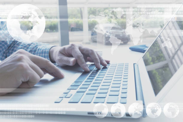 istock Hands of man using laptop, business technology concept 944034760