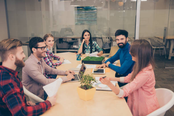 istock Young managers having meeting in office and discussing strategy of work 944035724
