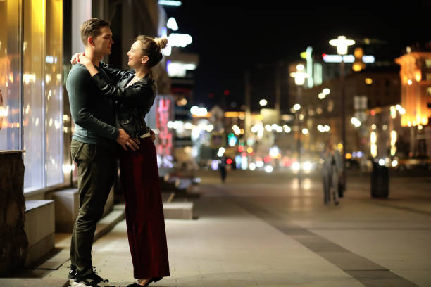istock Beautiful couple on a date in a night city 944038682