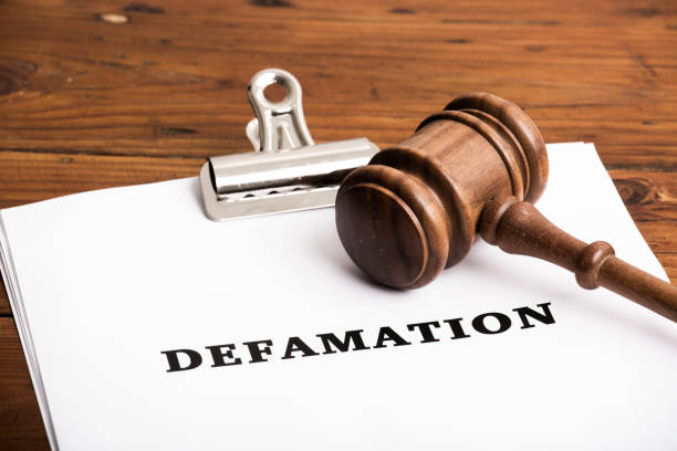 Defamation file in court with gavel stock photo