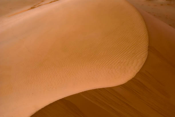 istock Beautiful texture Golden sand in the desert 944060444