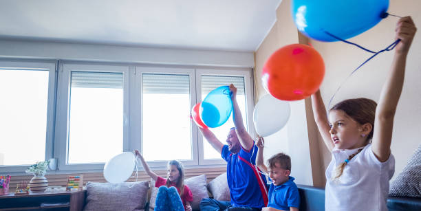 istock Happy family watching a soccer game together 944065742