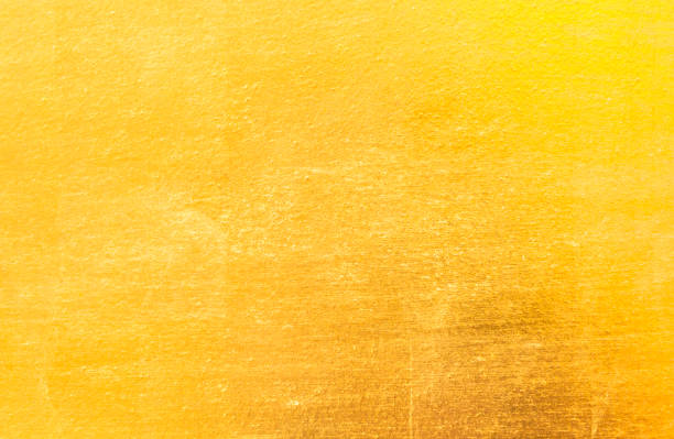 istock Shiny yellow leaf gold foil texture 944068490