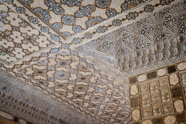 Ayina kari (mirror mosaic) in Sheesh Mahal (Palace of Mirrors), Amber Fort, Jaipur, Rajasthan, India. The silver on the mirrors has oxidied over time giving them a matte gray color.