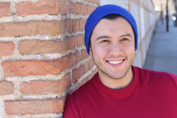 istock Man wearing knit hat outdoors 944090412