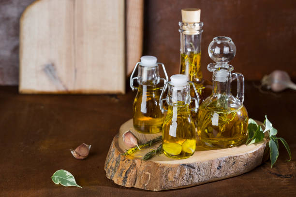 istock olive oil in glass bottles 944096718